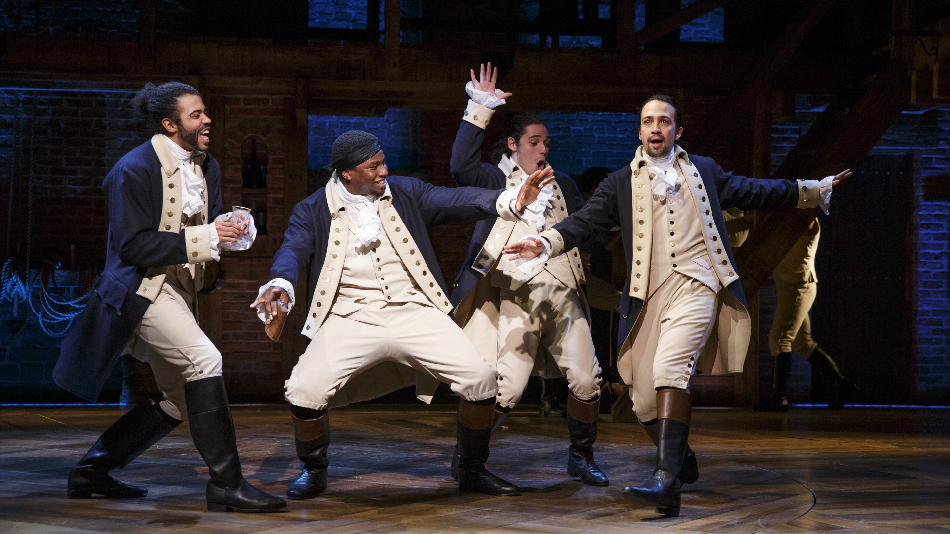 Photo of the original cast members of Hamilton: An American Musical, including Miranda himself (stage right)