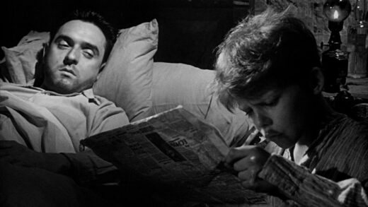 Michel reads to his dying brother in a scene from the 1952 film Forbidden Games