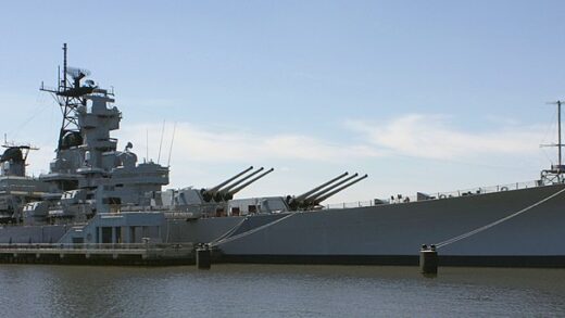 USS New Jersey at anchor on the shores of cosmopolitan Camden, New Jersey