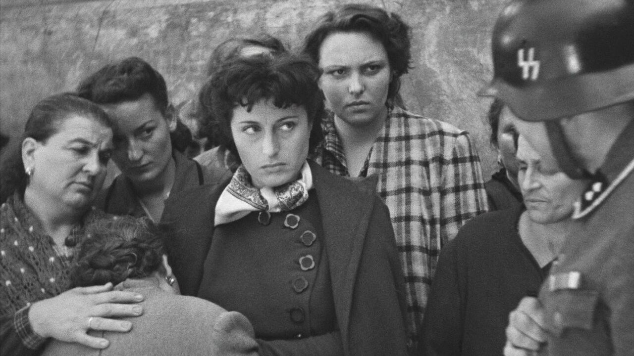 Actress Anna Magnini in a scene in "Rome: Open City" (1945) where the residents of a building have been drawn out by Nazi occupiers.