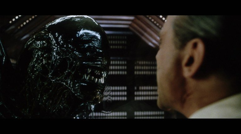 A scene in "Alien Resurrection" (1990) in which a mad scientist (Brad Dourif) expresses (unrequited) love for his aliens. 