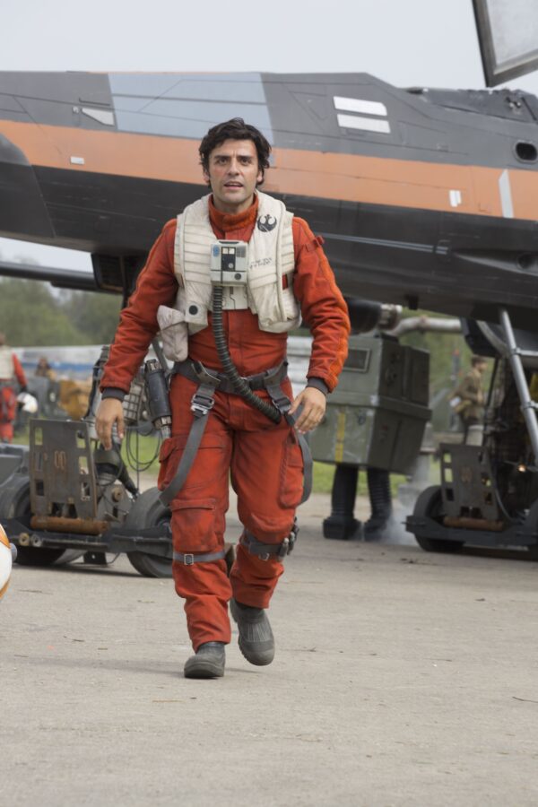 Fighter pilot Poe Dameron seeing his friend Finn still alive, in a scene from "The Force Awakens."