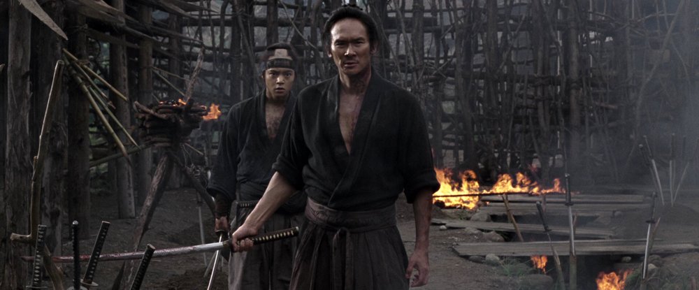 Still from one of the final action sequences in the movie "13 Assassins" (2010)