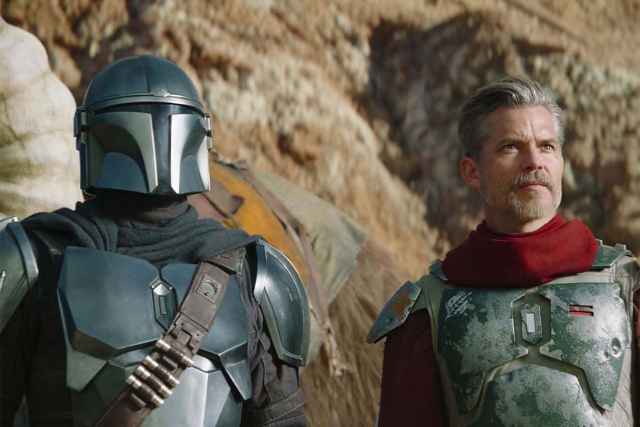 Mando (Pedro Pascal) and Marshal Cobb Vanth (Timothy Olyphant) in a still from season two opener of The Mandalorian