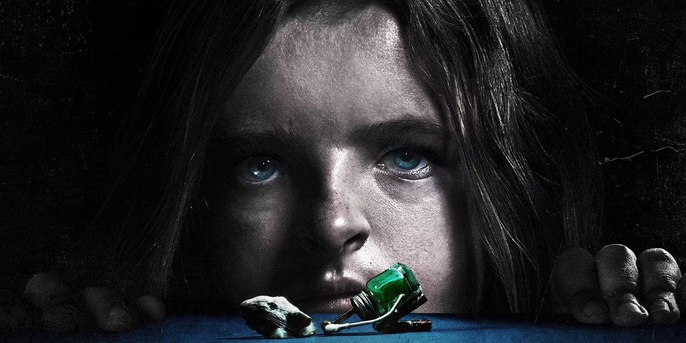Promotional image for the movie "Hereditary" of the characater Charlie before a miniature she has created that is itself decapitated.