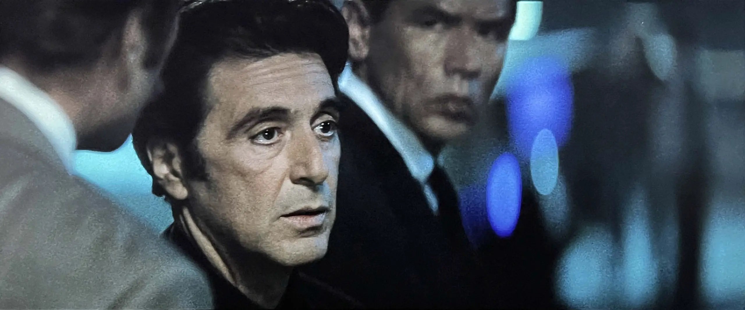 Close up of Al Pacino's character with his men at the scene of a crime in Michael Mann's 1995 film "Heat"