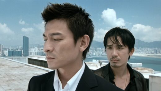 Still of the two characters on top of a building from the 2002 film "Infernal Affairs"