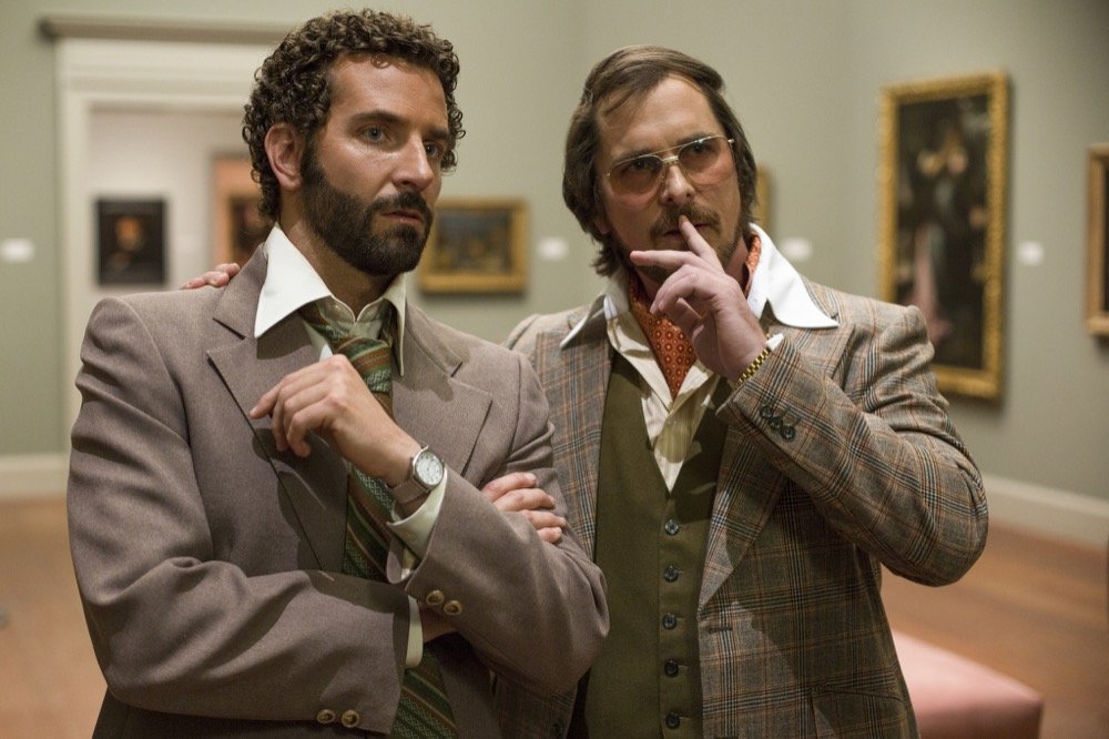 Scene featuring Christian Bale and Bradley Cooper in the 2013 film "American Hustle"