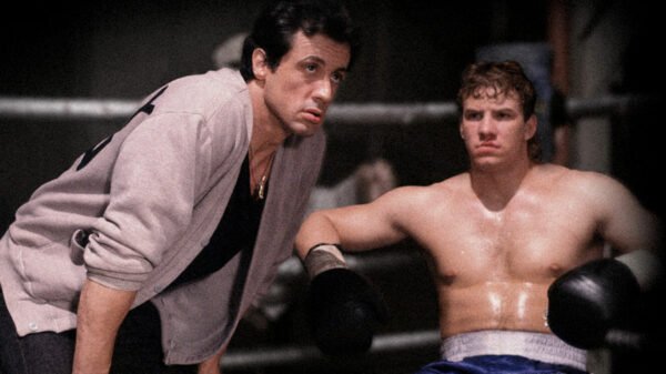 Still from Rocky V with the main characters in the ring
