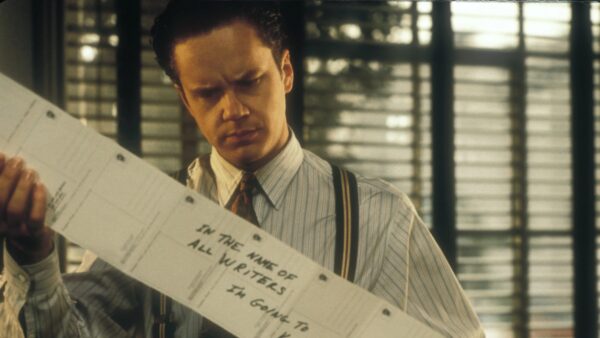 Still from The Player with Tim Robbin's character receiving hate mail
